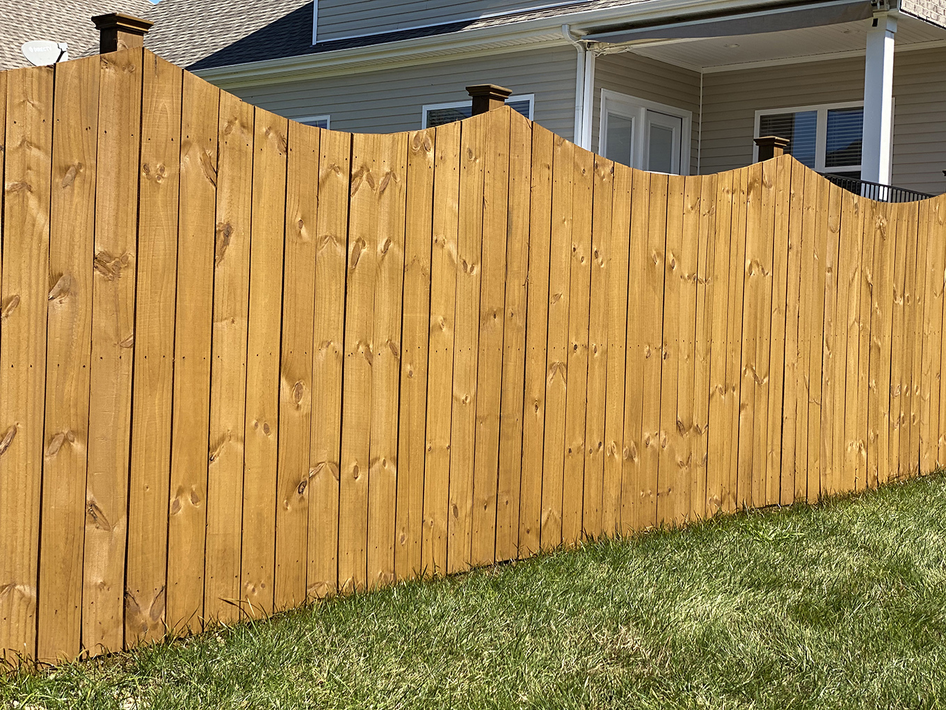 Photo of a clean fence from a Tennessee fence cleaning company